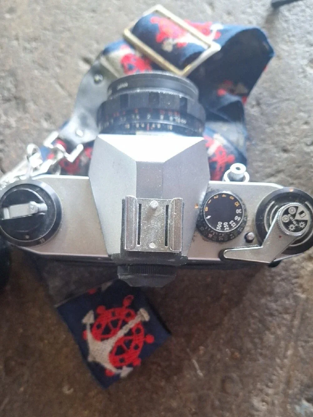 Vintage SLR Camera with Accessories - Silver and Black